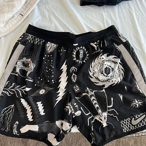 Nike polyester running short 7”